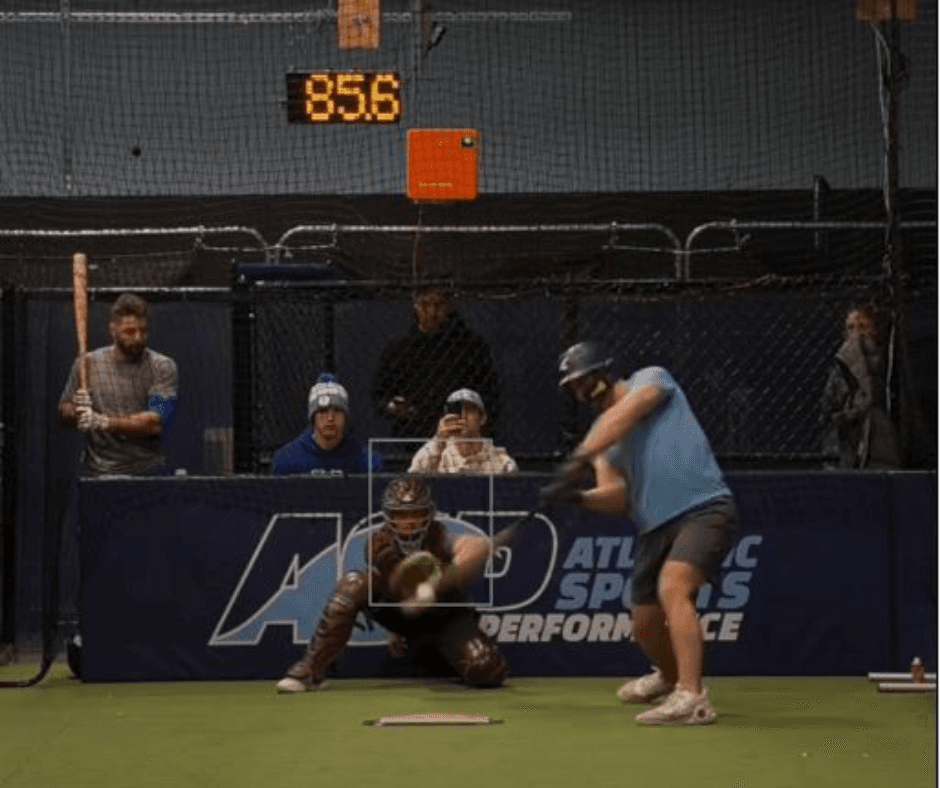 Pitcher training in Atlantic Sports Performance pitching tunnel with radar